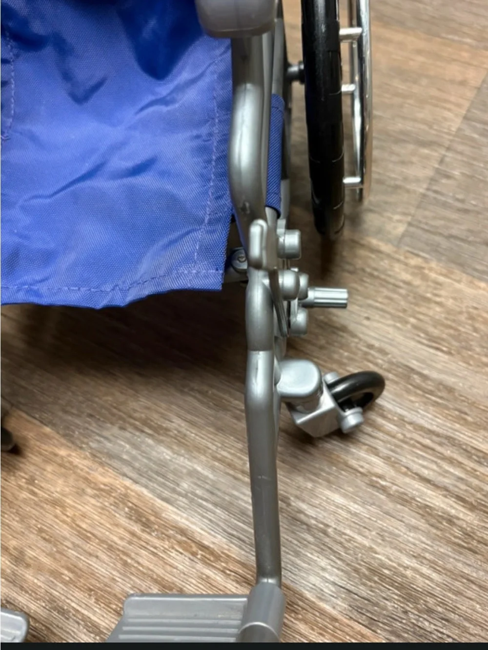 18in Doll Wheelchair Purple with purple crutches